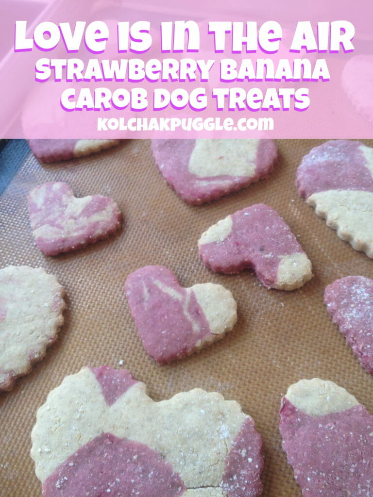 Heart shaped dog treats with marbled strawberry banana and carob flavoured dough.