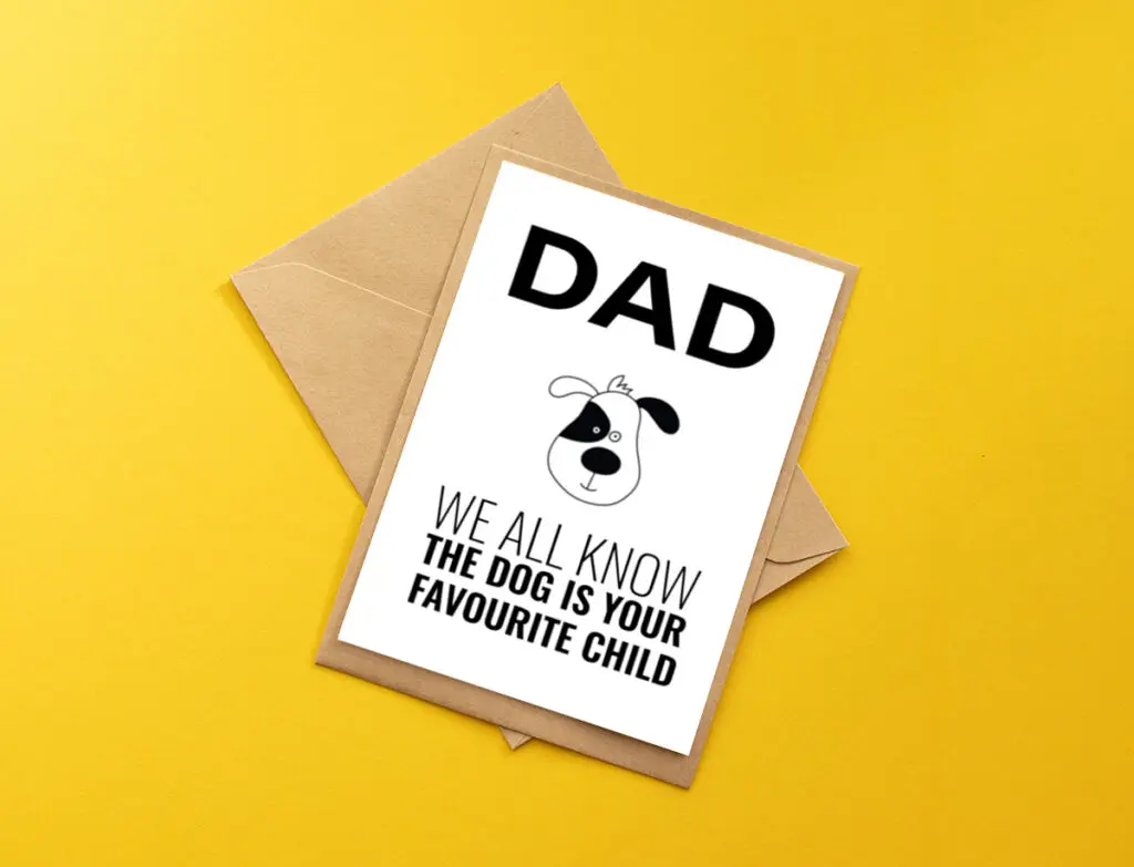 a free printable Father's Day card for dog dads with a craft paper envelope on a bright yellow background. Card says "Dad, we all know the dog is your favourite child"